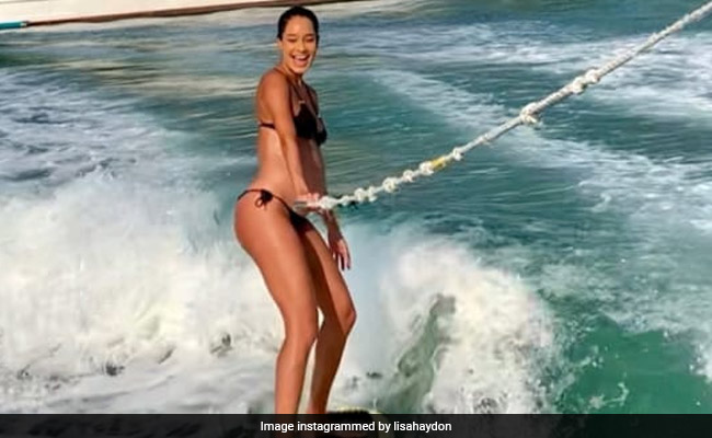 Pregnant Lisa Haydon Can't Stay Away From Surfing: 'Was Really Not Gonna... But'