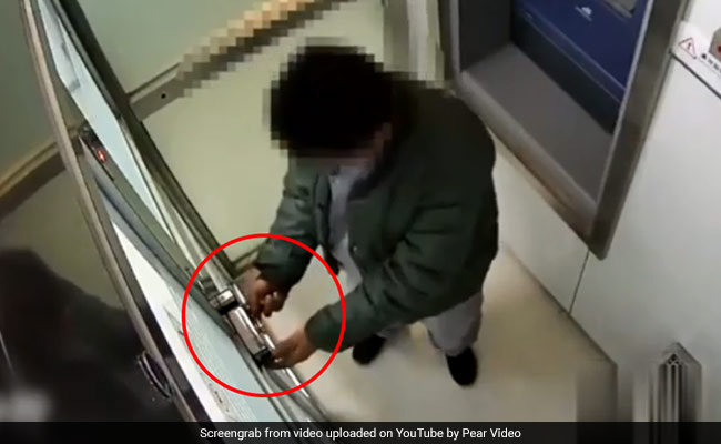 On Camera, ATM Robber Locks Door, Forgets How To Open It