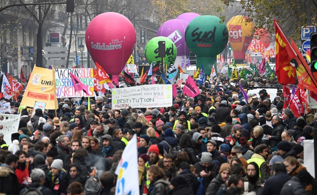 Thousands March As France Paralysed By Strike Over Pension System
