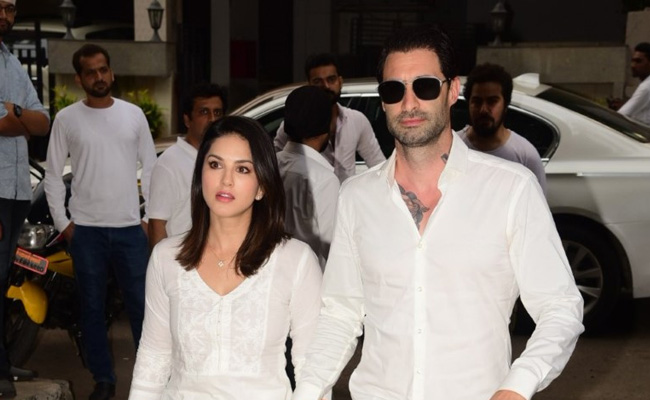Sunny Leone And Daniel Weber Attend Dabboo Ratnani's Mother Prabha Ratnani's Prayer Meet