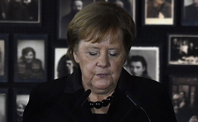 Angela Merkel Voices "Deep Shame" On First Visit To Auschwitz