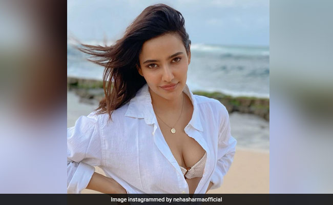 Actress Neha Sharma Breaks Winter Spell With Her Beach Vibe Holiday Pics