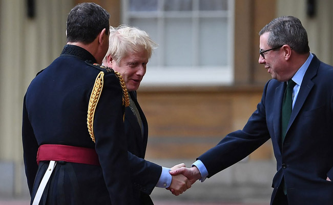 British PM Boris Johnson Arrives At Buckingham Palace After Poll Win