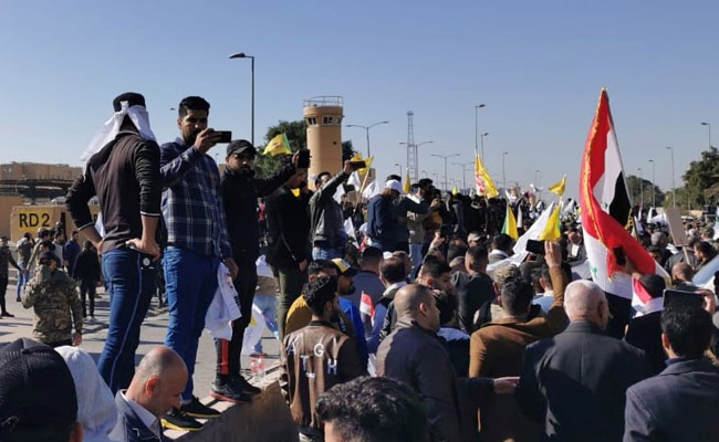 US Embassy In Baghdad, Stormed By Protesters Over Air Strikes, Evacuated