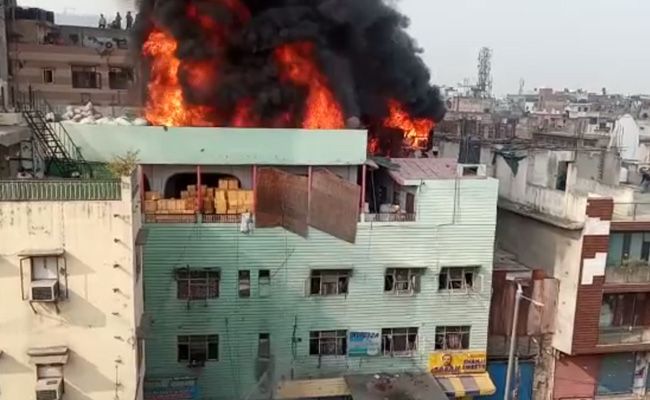 Relatives Of Delhi Fire Victims Struggle To Take Bodies Home