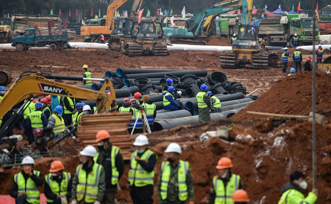 Coronavirus से लड़ने के लिए युद्धस्‍तर पर लगा चीन, वूहान में 10 दिन में तैयार होगा 1000 बेड वाला स्पेशल हॉस्पिटल