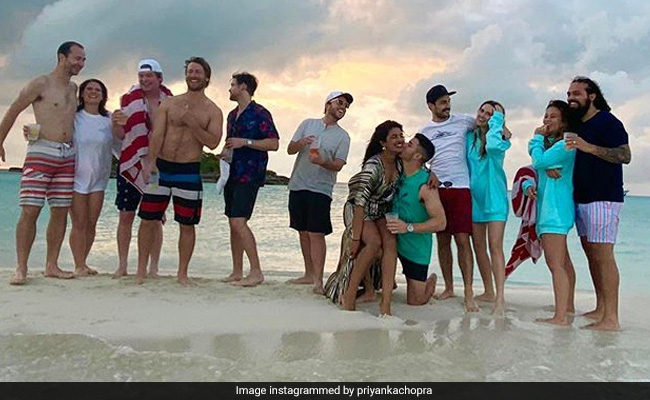 Priyanka Chopra, Nick Jonas Steal A Kiss On The Beach. <I>Isn't It Romantic</I>?