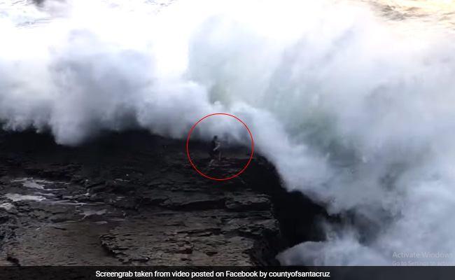 Horrifying Video Shows Huge Wave Sweep Beachgoer Into Ocean