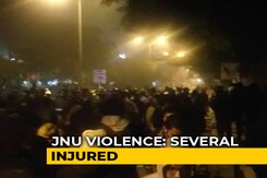 Watch: JNU Students March Towards Campus Gates After Mob Attack Watch: JNU Students March Towards Campus Gates After Mob Attack