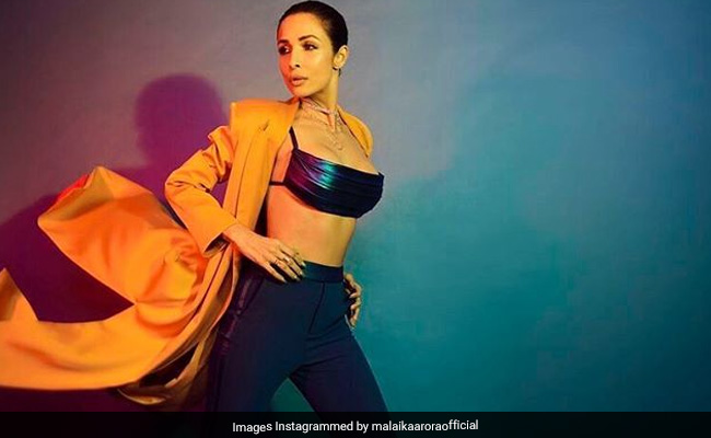 मलाइका अरोड़ा ने इस स्टाइलिश अंदाज में कराया फोटोशूट, Pics हुईं वायरल