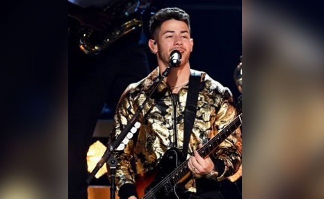 Grammys 2020: Nick Jonas, Trolled For Performing With Food In His Teeth, Says 'You Know I Eat My Greens'