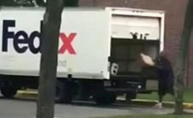 Caught On Camera: FedEx Driver Tossing Parcels Into Truck