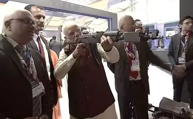 Watch PM Narendra Modi Shoot Assault Rifle At DefExpo 2020