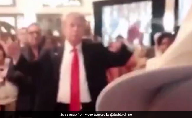 In Video, Trump Mimics Orchestra As US Anthem Plays, Others Stand Still