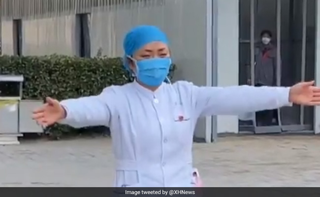 Watch: Nurse At China Coronavirus Hospital Gives Crying Daughter An 'Air Hug'