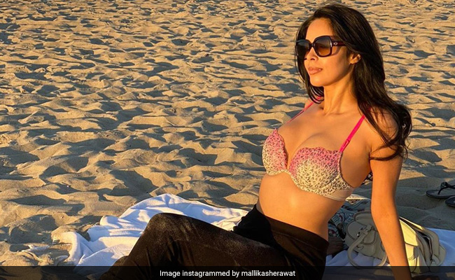 Mallika Sherawat On The Benefits Of Yoga And The Diet Rule She Doesn't Break