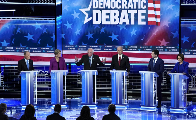 Democrat Rivals Unite Against Billionaire Michael Bloomberg At Debate