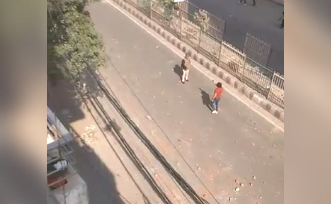 Watch: Man Opens Fire In Front Of Cop During Delhi CAA Clashes