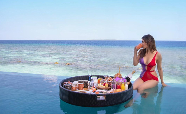 Mouni Roy In A Colour-Blocked Swimsuit Sets Beach Goals