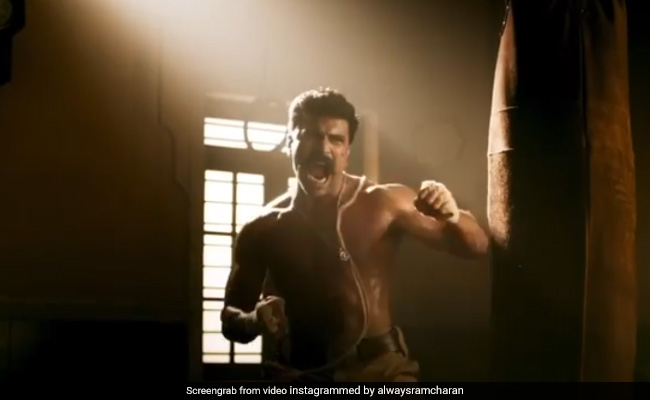 <I>RRR</I>: Ram Charan's First Look As Ramaraju Is His Birthday Treat To Fans