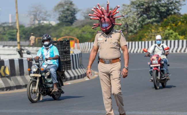 Chennai Cops Use "Coronavirus Helmet" To Raise Awareness On COVID-19