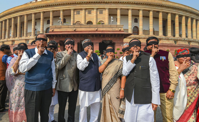 Finger On Lips And Blindfolded, Trinamool MPs Protest Delhi Violence