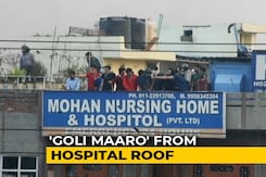 New Video Shows Men Firing At Crowd From Hospital During Delhi Clashes New Video Shows Men Firing At Crowd From Hospital During Delhi Clashes