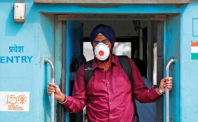 People are encouraged to wear masks when travelling or outdoors