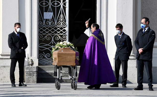 Coronavirus Pandemic: Italy Priest Deals With Death On An Industrial Scale