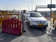 गौतमबुद्ध नगर की सीमाएं की जा रही हैं सील, पैरामिलिट्री फोर्स का सड़क पर पैदल मार्च