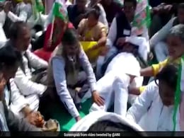 JDU Legislator Gets Leg Massage By Partymen At Nitish Kumar's Rally JDU Legislator Gets Leg Massage By Partymen At Nitish Kumar's Rally