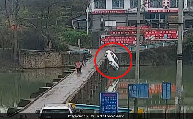 Busy On Phone, Driver Crashes Into River 10 Minutes After Getting License