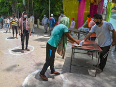 लॉकडाउन: अप्रवासी मजदूरों के परिवारों की बढ़ी दुश्वारियां, सरकारी खाने के पैकेट पर निर्भर