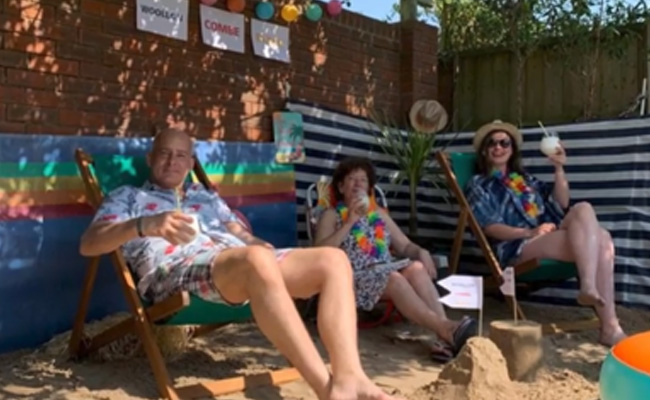 Family In Lockdown Creates A Beach In Their Backyard. Watch