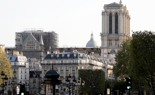 Notre-Dame's Bell Tolls In Tribute To Medics On Anniversary Of Inferno