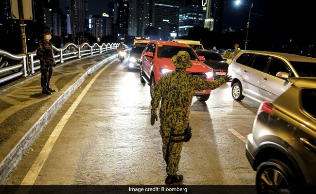 People Locked in Cages, Beaten, Shamed As Nations Enforce COVID-19 Rules