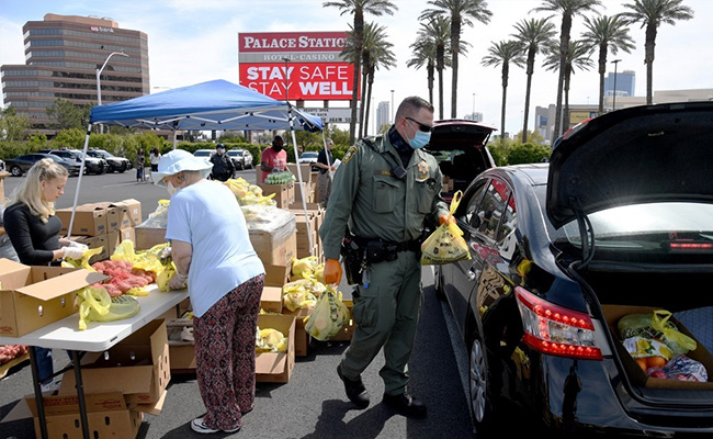 Hungry, Unemployed Americans Line Up At Food Banks Amid Coronavirus Pandemic