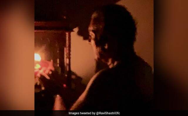 Fans trolled Ravi Shastri after he posted a Photo to show unity in fight against coronavirus Fans trolled Ravi Shastri after he posted a Photo to show unity in fight against coronavirus
