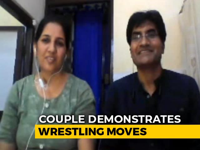 Wrestling Coach Trains Others On Internet, Wife Partners On Mat