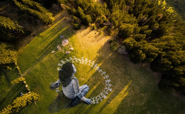 "Beyond Crisis": Massive Coronavirus-Themed Graffiti In Swiss Alps