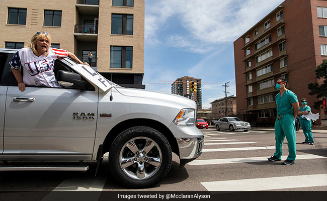 लॉकडाउन का विरोध करने सड़कों पर जा रहे थे लोग, तभी सामने आया एक और फिर... देखें Video