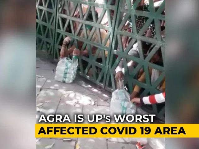 Hands Reach For Water, Biscuits From Shut Gates At Agra Quarantine Unit