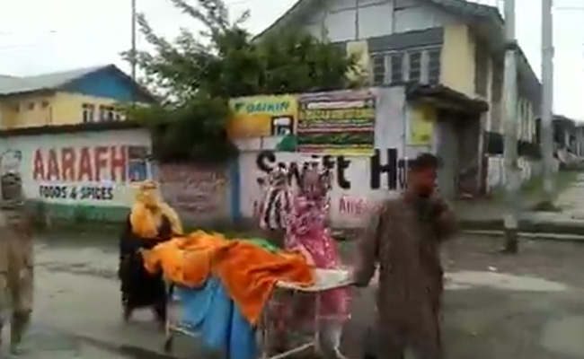 Video Of J&K Family Carrying Woman's Body On Stretcher Triggers Protests
