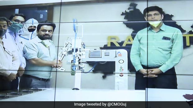 Vijay Rupani Launches India's First PPE Kit Seam Sealing Machine In Rajkot