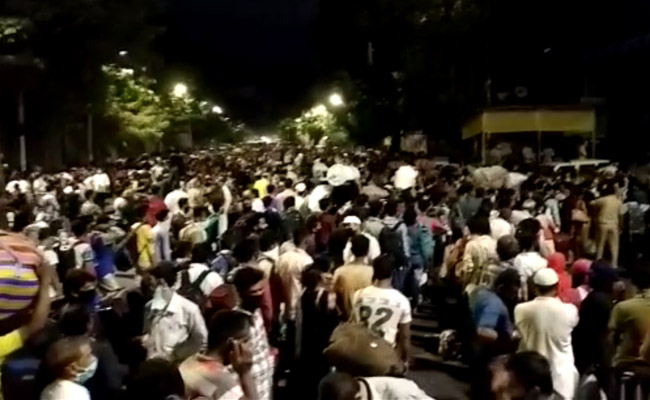 Hopeful Of Boarding Train Home, Migrants Gather Outside Mumbai Station
