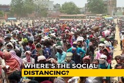 Desperate To Go Home, Migrants Swarm Ground Near Delhi For Buses Desperate To Go Home, Migrants Swarm Ground Near Delhi For Buses