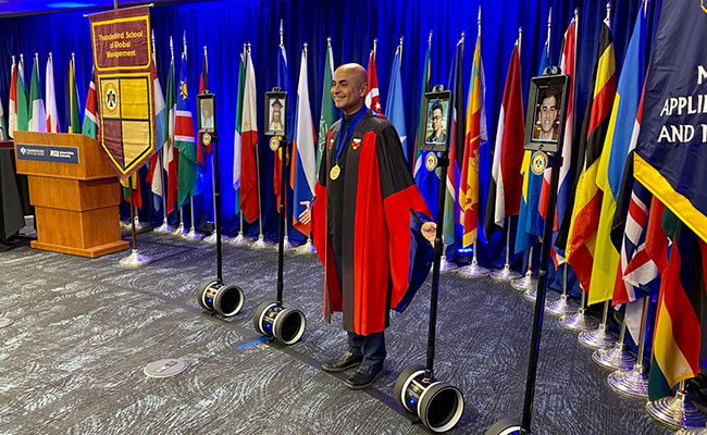 "Graduating Virtually": Arizona Students Get Their Diplomas Via Robots