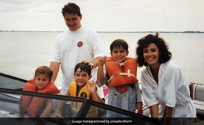 Can You Spot Cutie-Pie Nick Jonas In This Mother's Day Post?