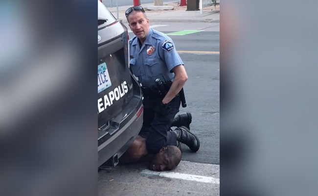 US Cop Who Kneeled On Black Man's Neck Charged With Third-Degree Murder