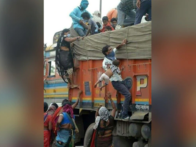 Chhattisgarh: Man Clutches Baby In Scramble To Get On Truck